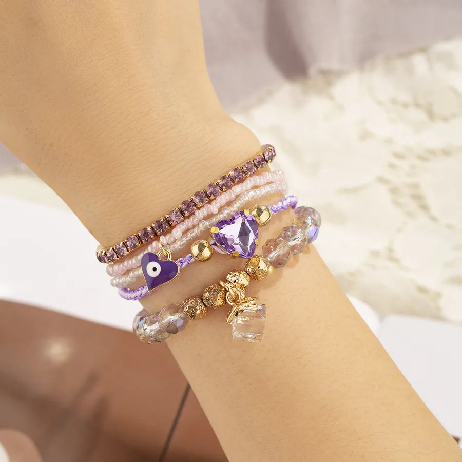 Elevate Your Style with the Bohemian Multi-Layer Zircon Pendant Bracelet
