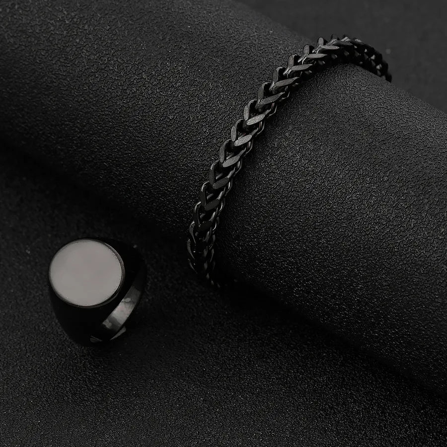 Discover the Elegance of the Stainless Steel Titanium Alloy Bracelet & Ring Set