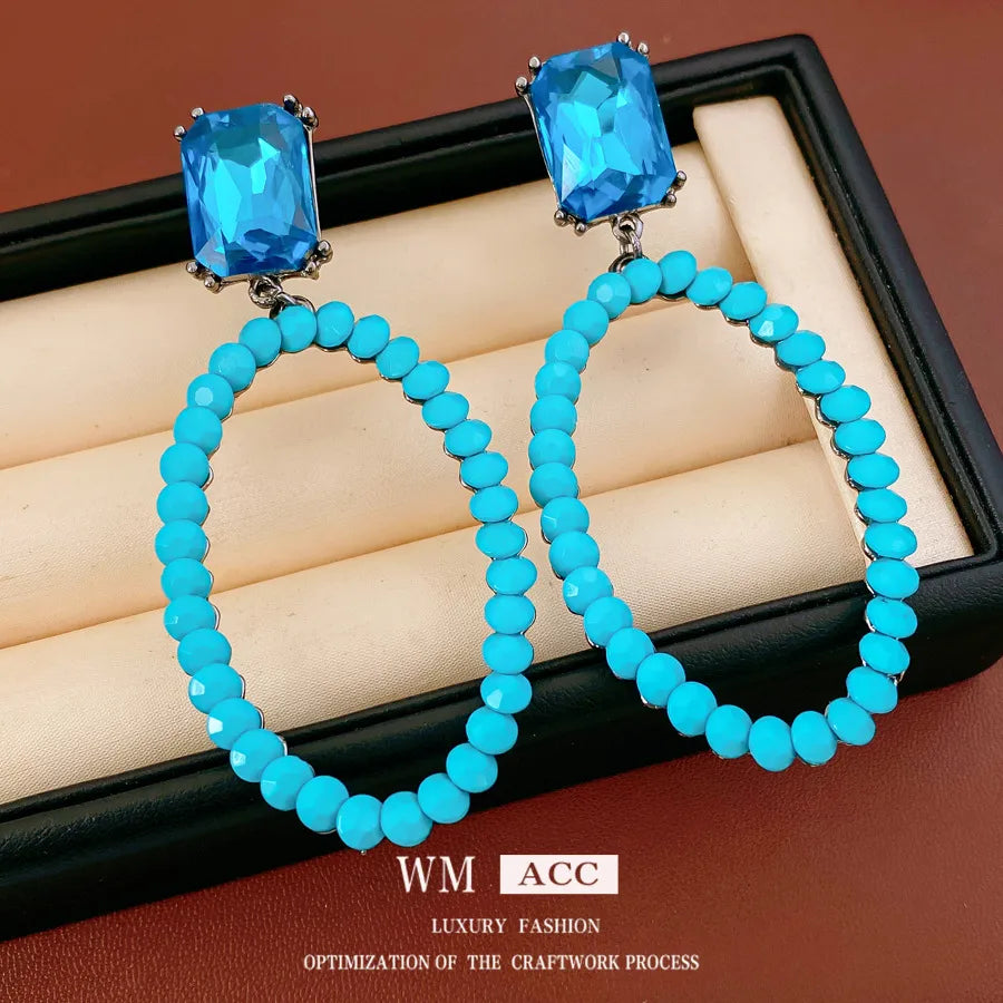 Discover the Elegance of Vintage Hollow Resin Inlaid Diamond Oval Earrings