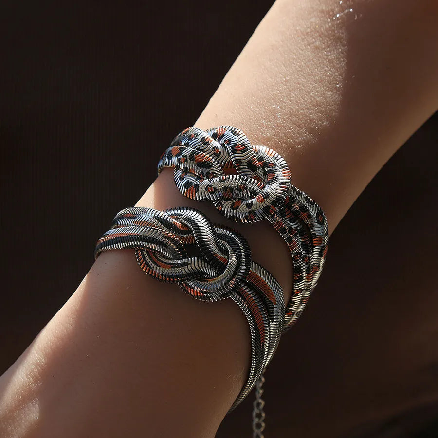 Discover the Elegance of the Wild Leopard Print 304 Stainless Steel Braided Rope Bracelet