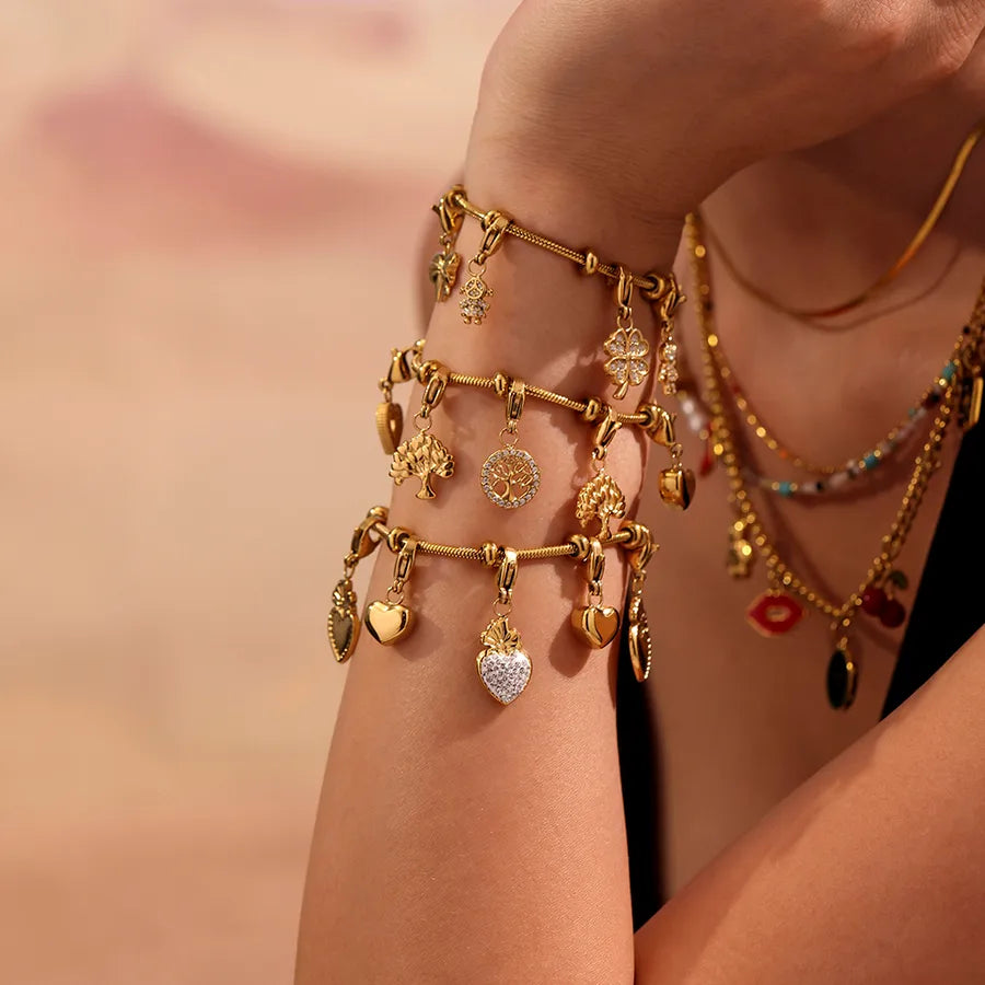 Elevate Your Style with the Four Leaf Heart Butterfly Knot Bracelet
