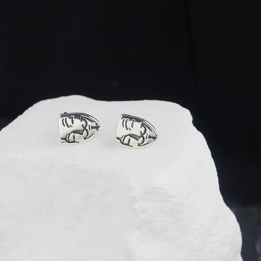 Discover the Vintage Mask Earrings for Men: A Trendy Accessory for Every Occasion