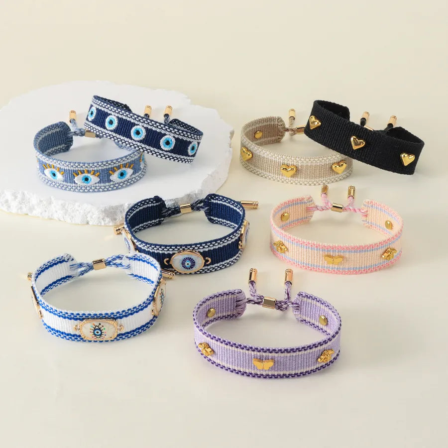 Discover the Elegance of the Handmade Butterfly Alloy Adjustable Tassel Bracelet