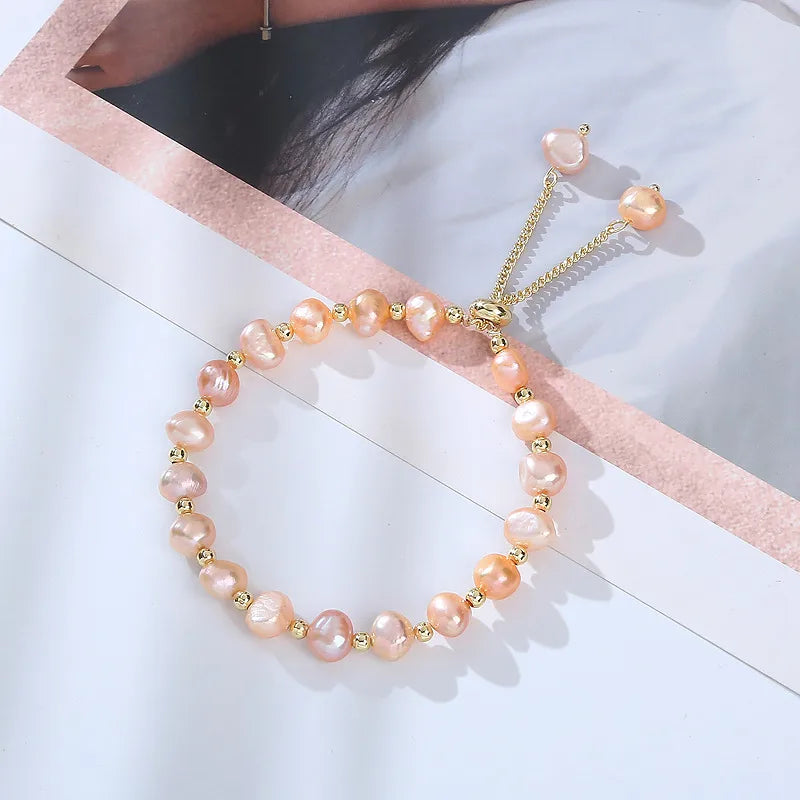 Discover Elegance with Our Geometric Pearl Beaded Bracelets
