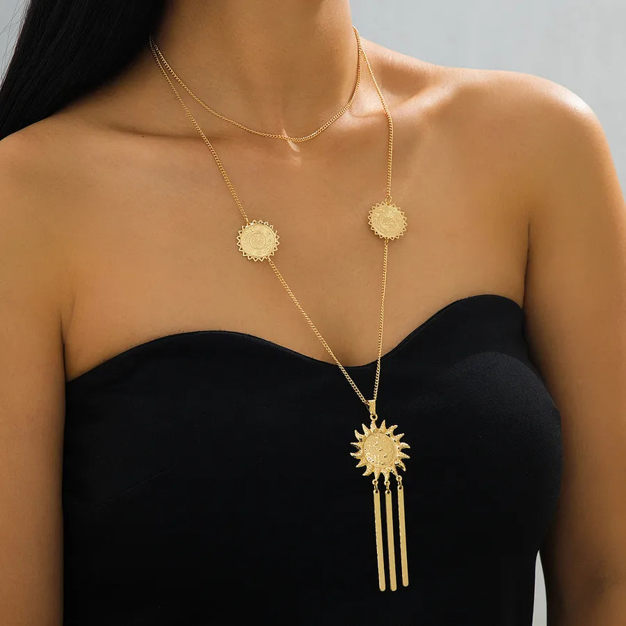 Elevate Your Style with the Golden Yellow Small Sun Tassel Necklace