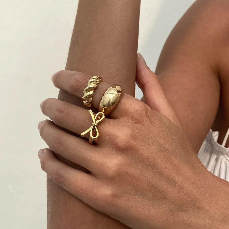 Discover Elegance with the Sweet Golden Bow Tie Ring for Women