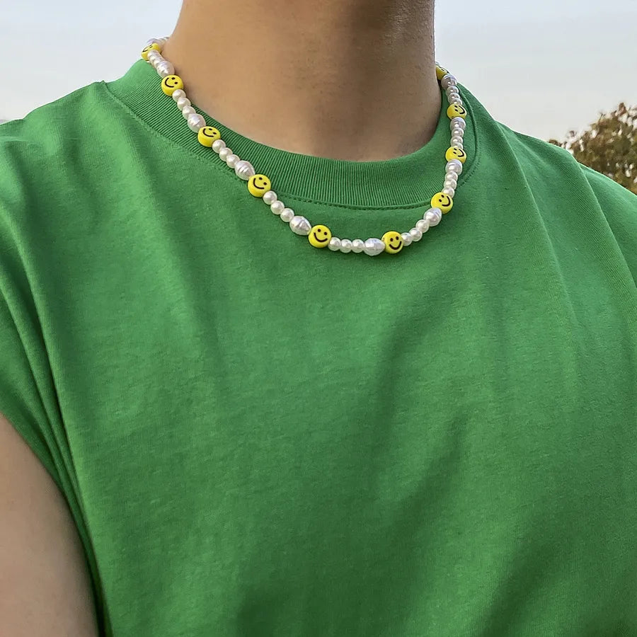 Elevate Your Style with the Fashionable Hip Hop Single Layer Pearl Acrylic Smiley Face Mosaic Necklace