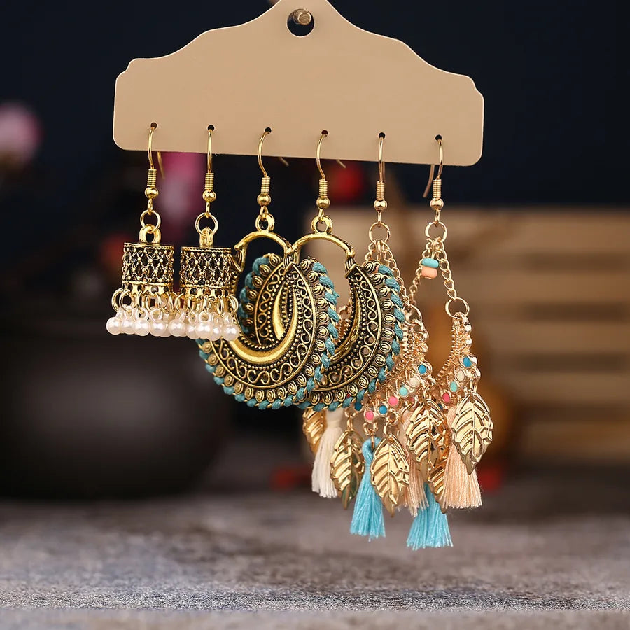 Elevate Your Style with Retro Bohemian Ethnic Style Tassel Bell Pendant Earrings
