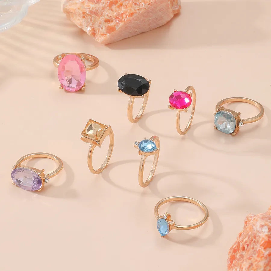Discover the Elegance of Our Luxurious Geometric Shaped Multi-Colored Embedded Gemstone Ring Set
