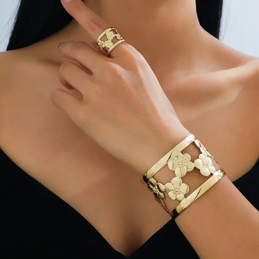 Elevate Your Style with the Women's Simple Floral Hollow Bracelet and Ring Set