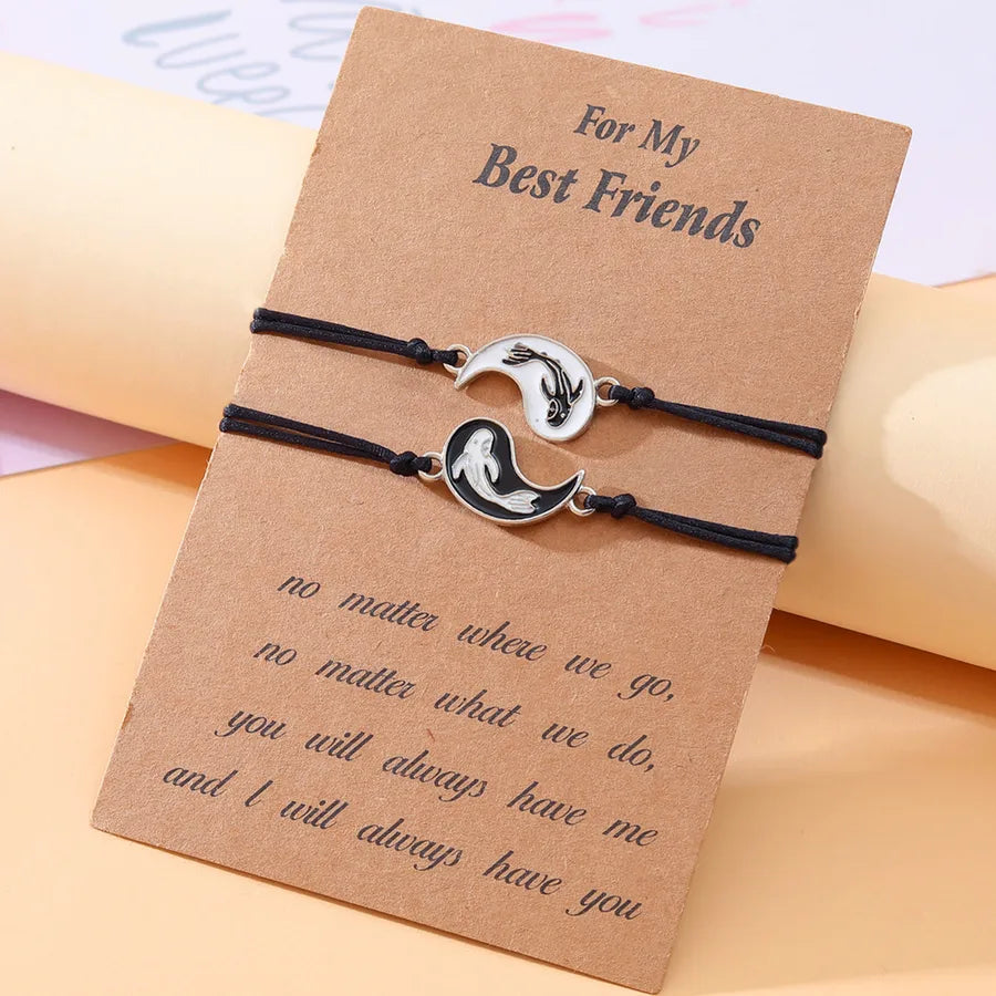Discover Elegance with the 2 Pieces Tai Chi Fish Bracelet Set