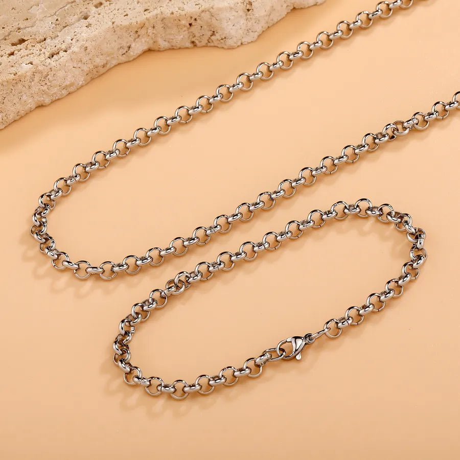 Elevate Your Style with the O-Shape Cross Chain Necklace and Bracelet