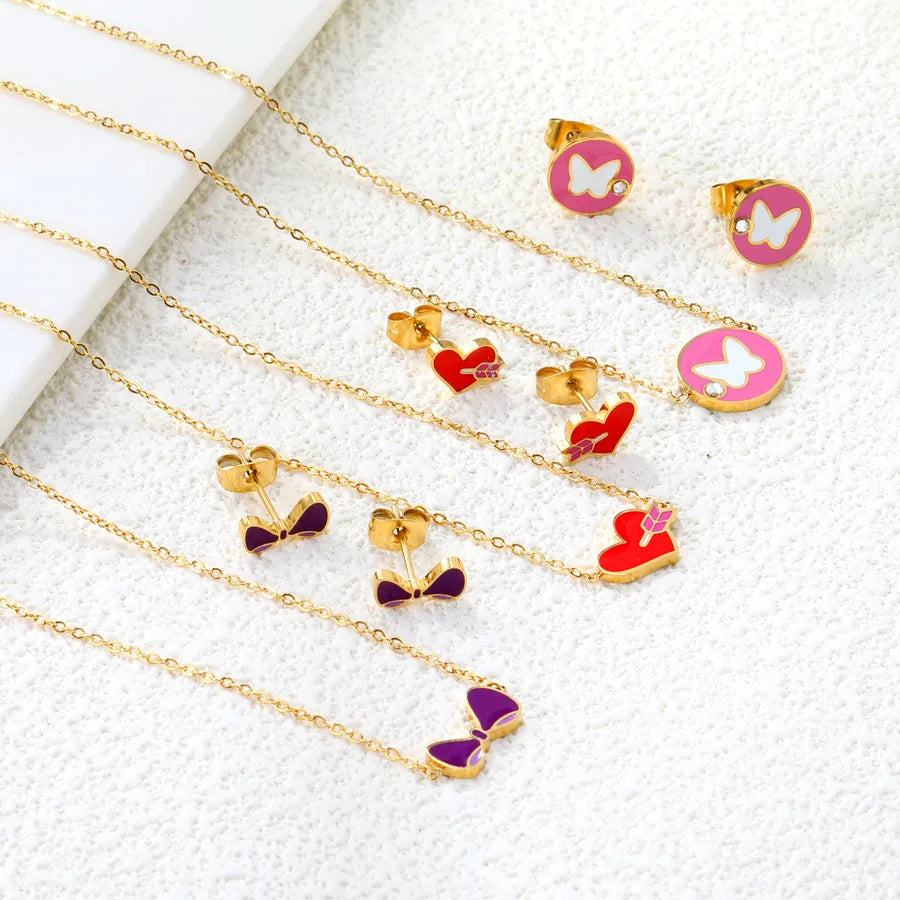Discover the Enchantment of Our Butterfly Heart Shaped Pendant Necklace and Earring Set