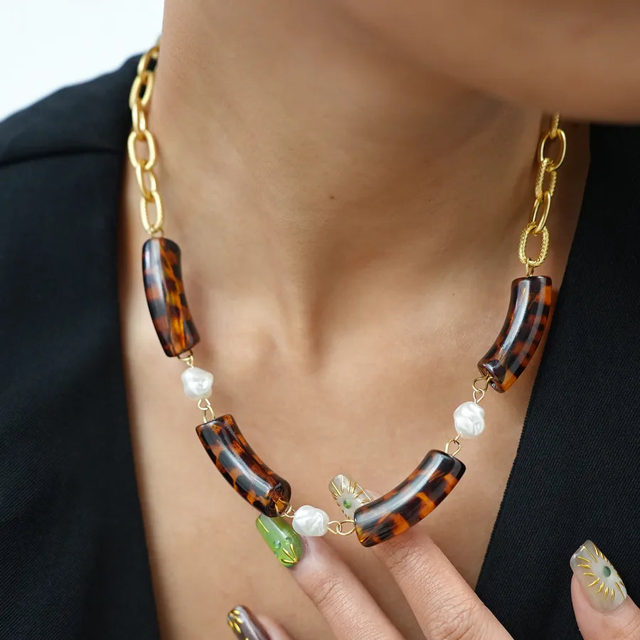 Elevate Your Style with the 304 Stainless Steel 18K Gold Plated Women Leopard Pearl Necklace