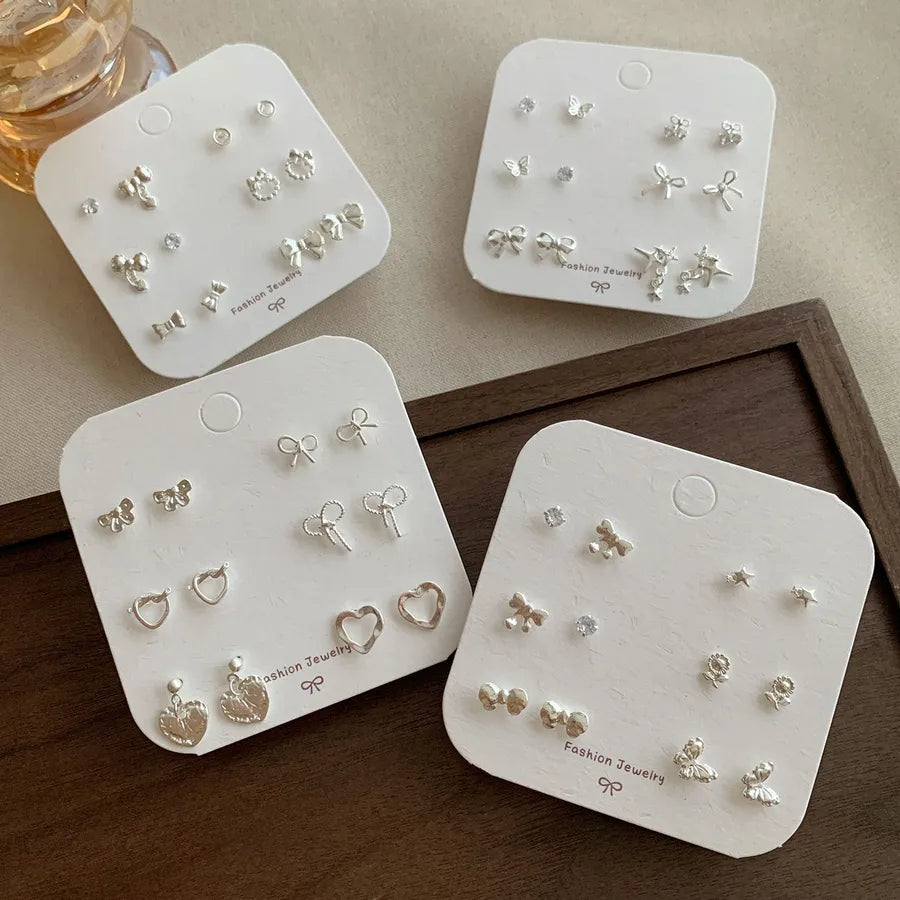 Discover Elegance with Our Mini Silver Heart-Shaped Stud Earrings