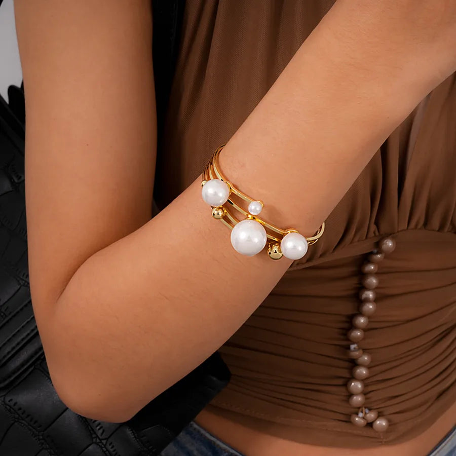 Elevate Your Style with the Metal Pearl Open Bracelet