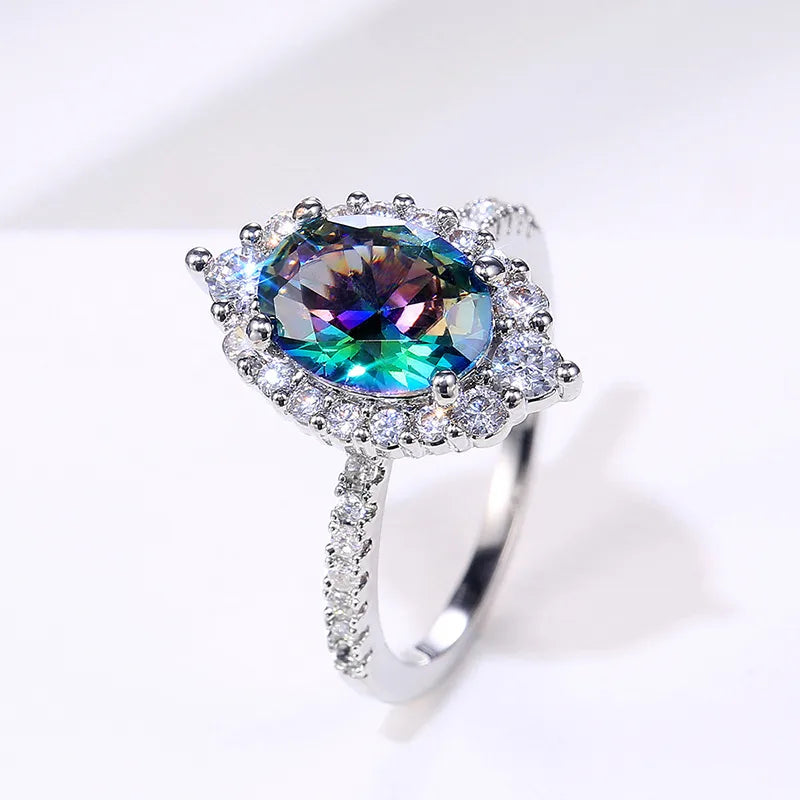 Discover Elegance with Our Fashion Copper Inlaid Colored Zircon Oval Ring