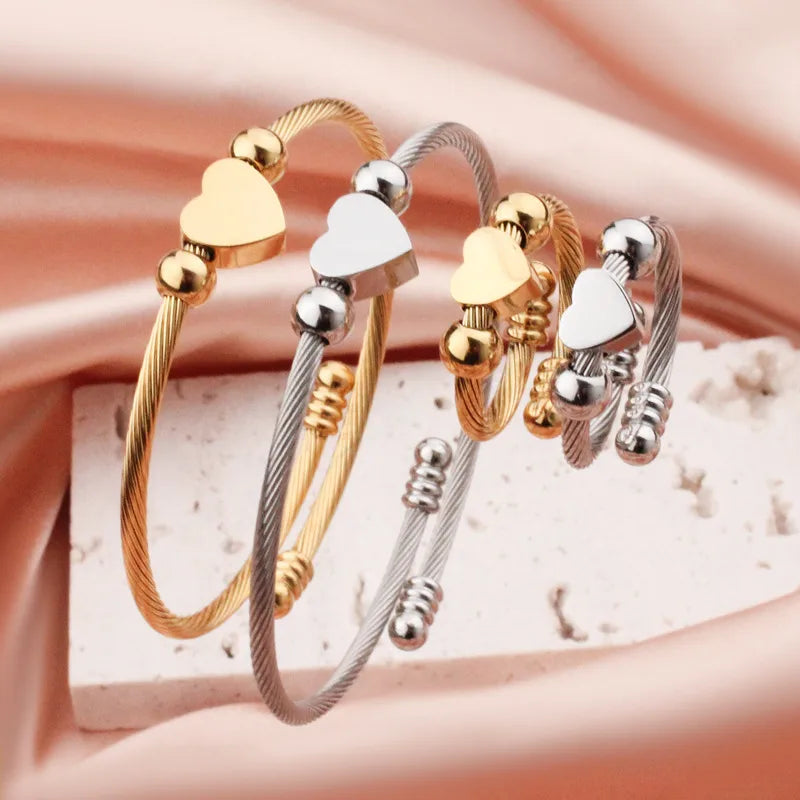 Discover the Elegance of Fashion Heart Shape Titanium Steel Rings and Bracelets