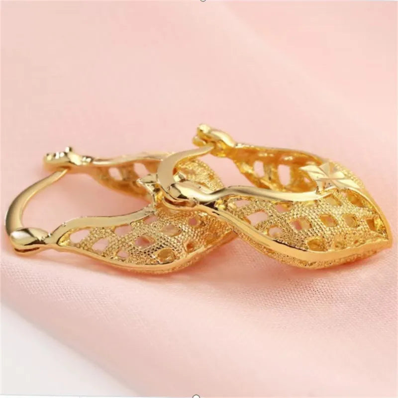 Discover the Elegance of Gold Stripe Heart Shaped Ear Cuff - A Must-Have Jewelry Accessory