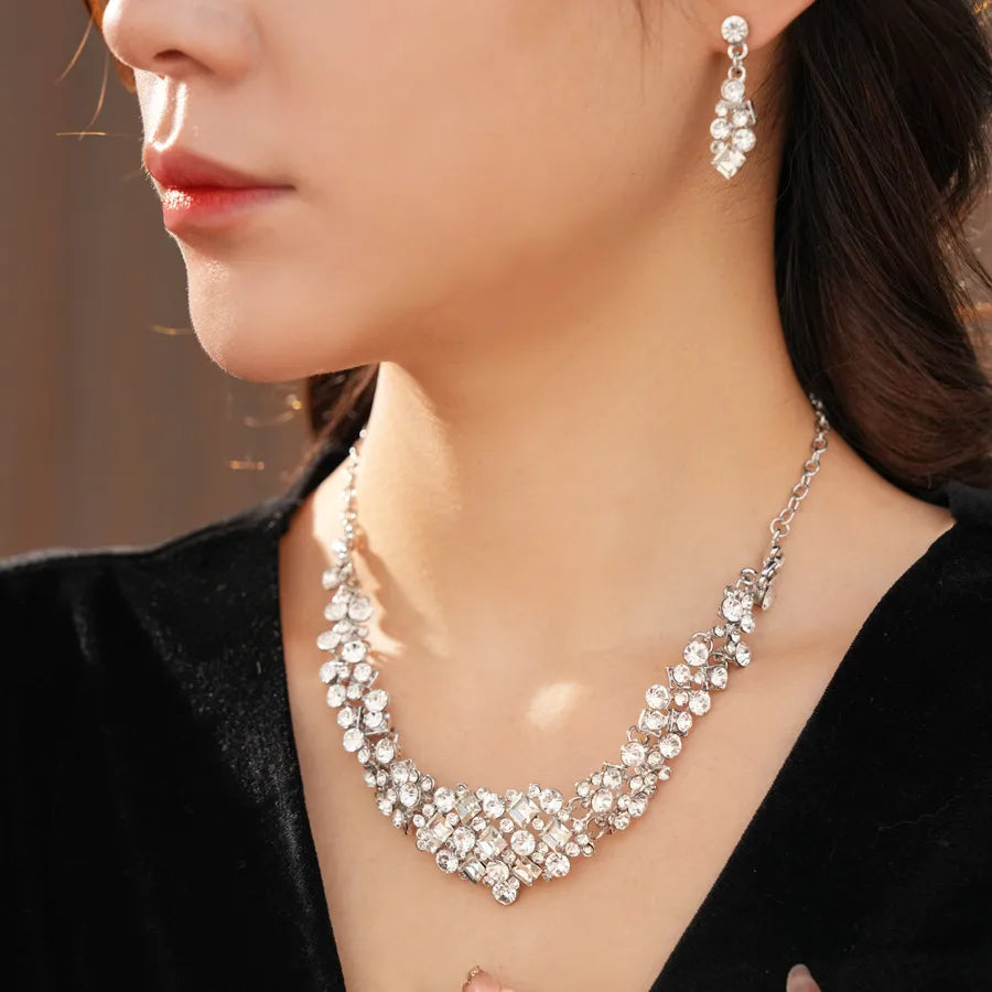 Elevate Your Elegance with the Silver Pin Inlaid Diamond Geometric Rhombus Earrings and Necklace Set
