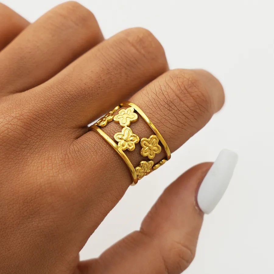 Elegance Redefined: The 304 Stainless Steel 18K Gold Plated Women Flower Hollow Open Ring