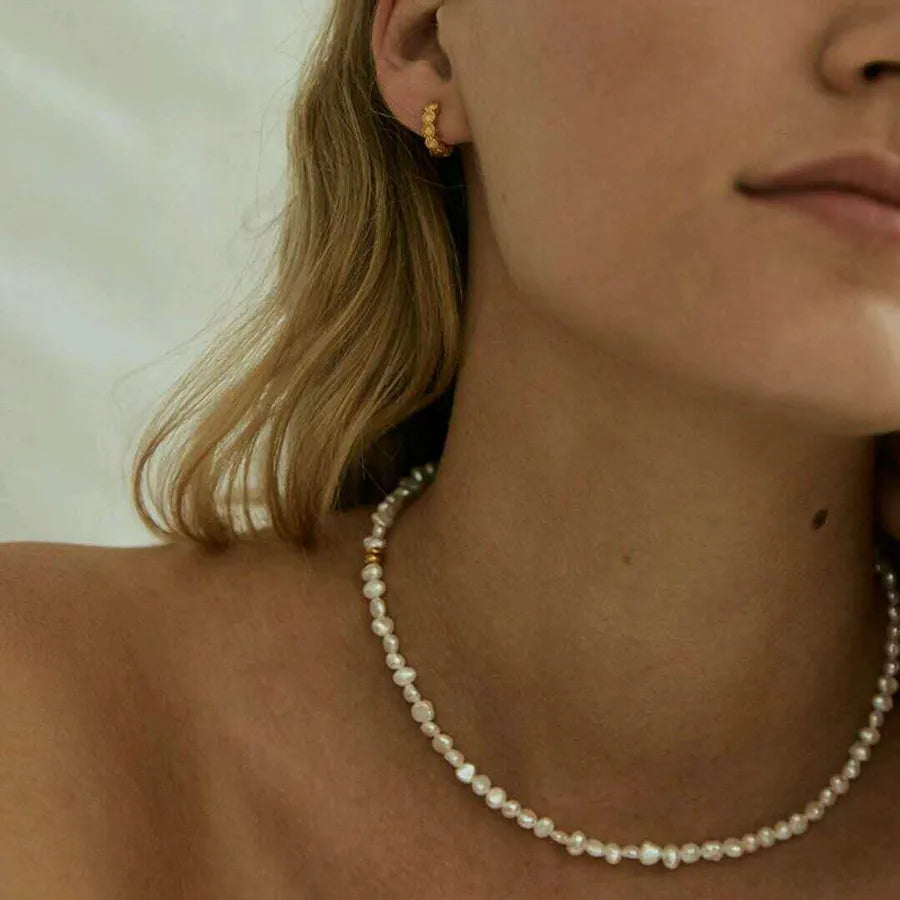 Elevate Your Style with the Elegant Solid Color Pearl Titanium Steel Beaded Plating Necklace