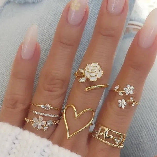 Discover the Elegant Zinc Alloy Hollow Out Flower Heart Ring Set for Women