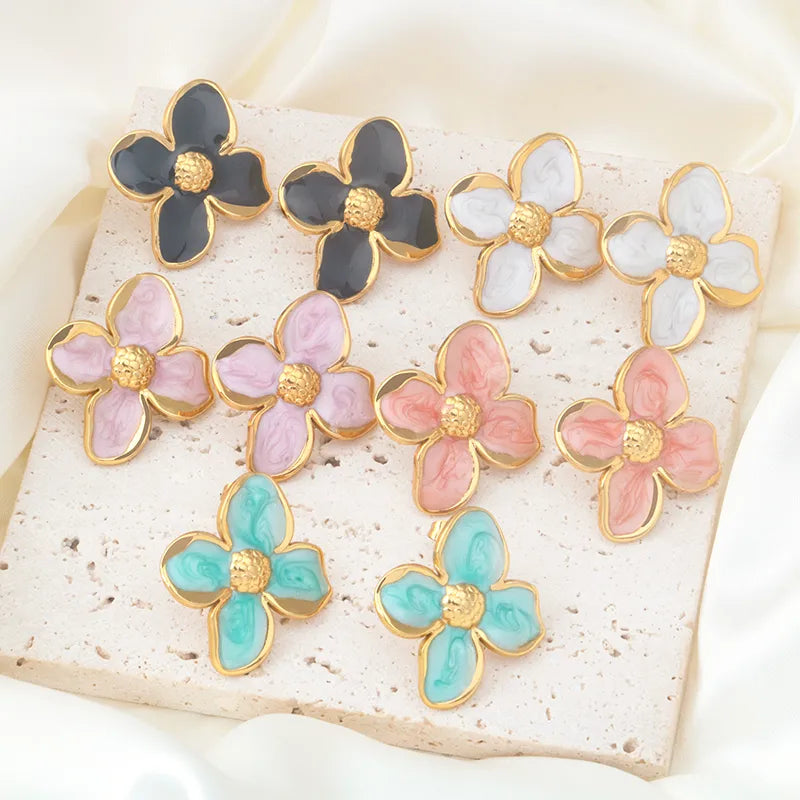Discover the Elegance of Geometric Flower Titanium Steel Ear Studs