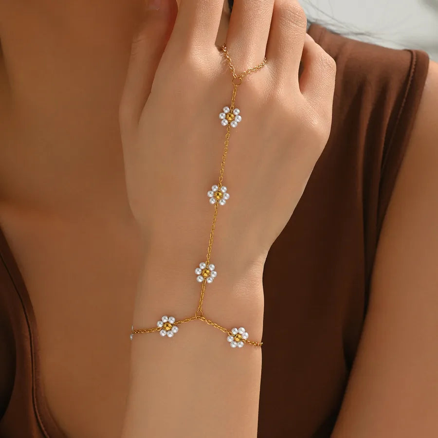 Elevate Your Style with Our Flower Water Plated Alloy Bracelet