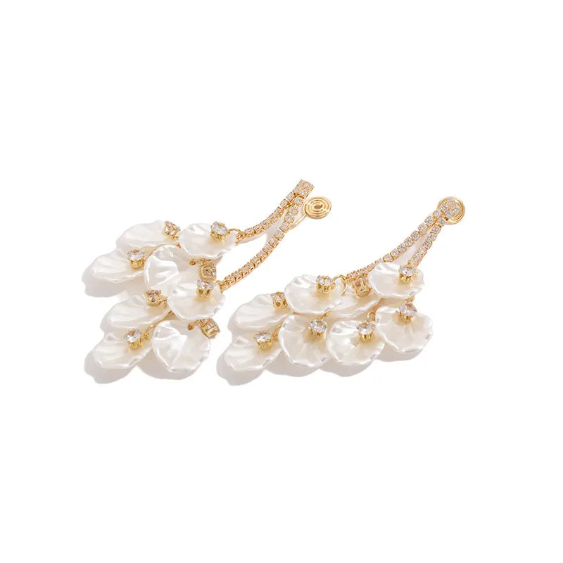 Discover Elegance with White Petal Tassel Earrings – A Must-Have Accessory