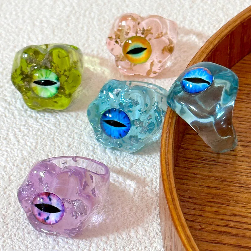 Unveiling the Elegance of the Resin Gold Leaf Geometric Oval Blue Eye Devil's Eye Ring