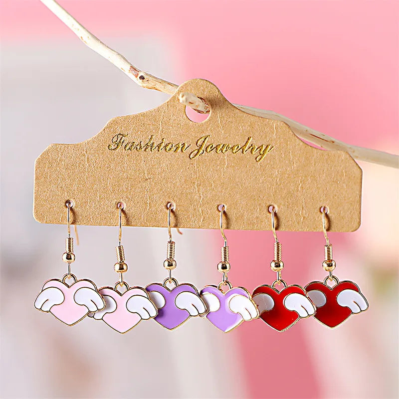 Discover the Allure of Fashionable Angel Wings Heart-Shaped Alloy Earrings