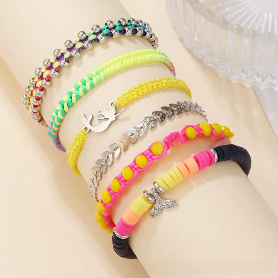 Discover the Enchantment of the Multicolor Soft Clay Stainless Steel Mermaid Tail Bracelet Set