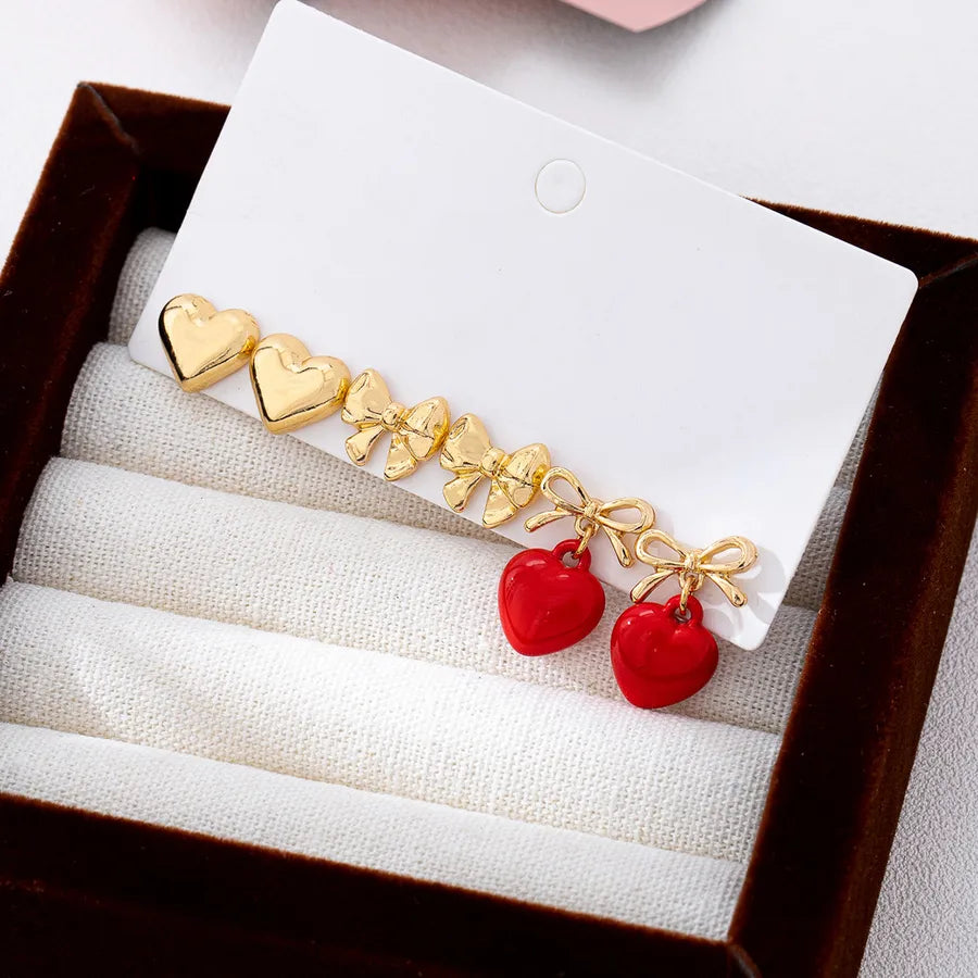 Elevate Your Style with Our Butterfly Bow Heart Shaped Earrings Set