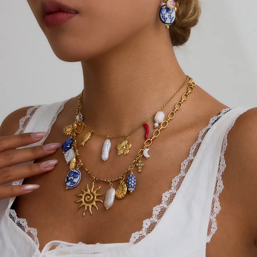 Elevate Your Style with Wholesale Jewelry: Sun Heart Shape Stainless Steel Titanium Steel Pearl Plating Ceramics Collection