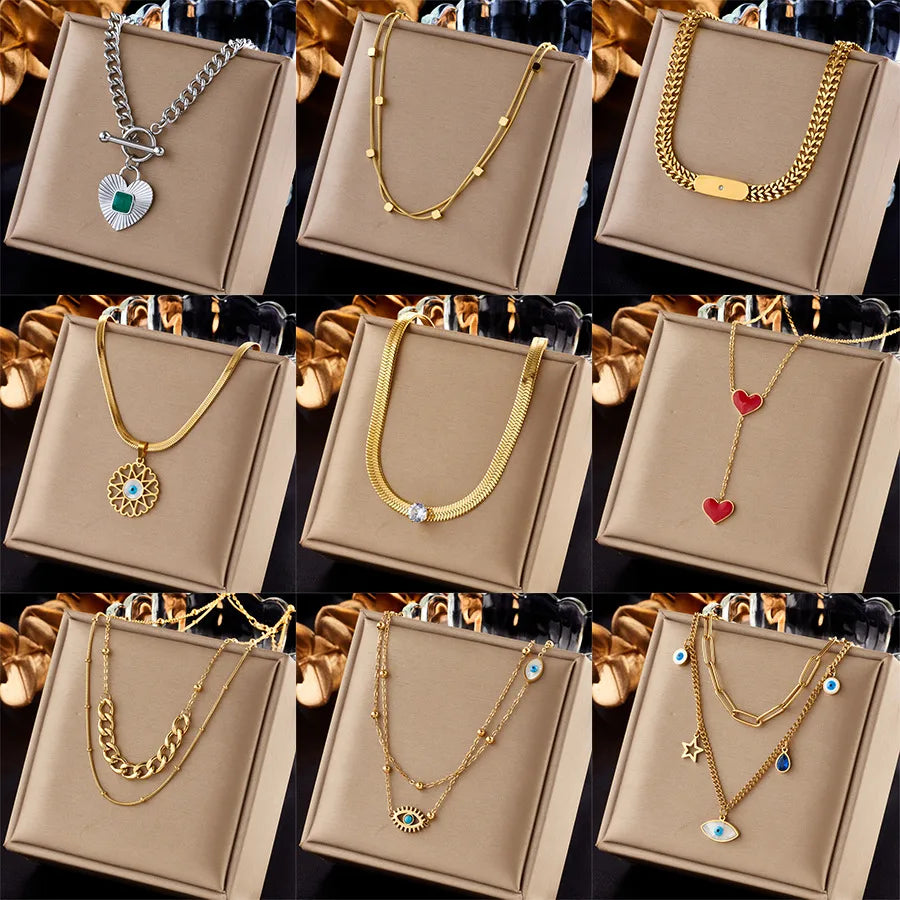 Elevate Your Style with the Lady Heart Shape Eye Titanium Steel Plating Necklace