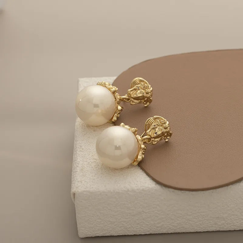 Elevate Your Style with Abstract Portrait Metal Pendant Pearl Earrings