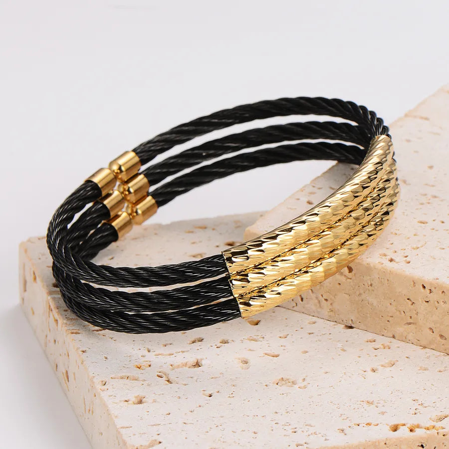 Elevate Your Style with the Minimalist 304 Stainless Steel Imitation Gold Plated Wide Three-Layer Wire Letter Open Bracelet for Men