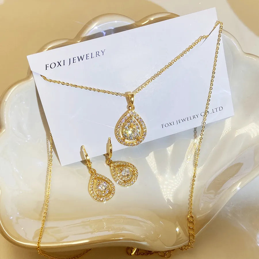 Elevate Your Elegance with the Light Luxury Water Drop Pear-Shaped Pendant Earrings