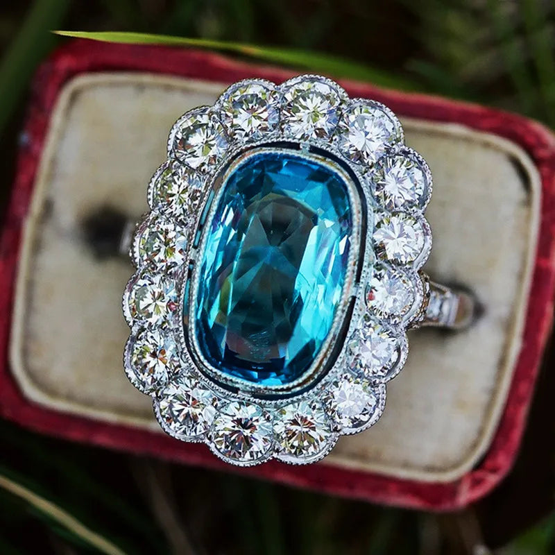 Discover Elegance with Our Fashion Copper Inlaid with Sea Blue Zircon Women's Oval Large Ring