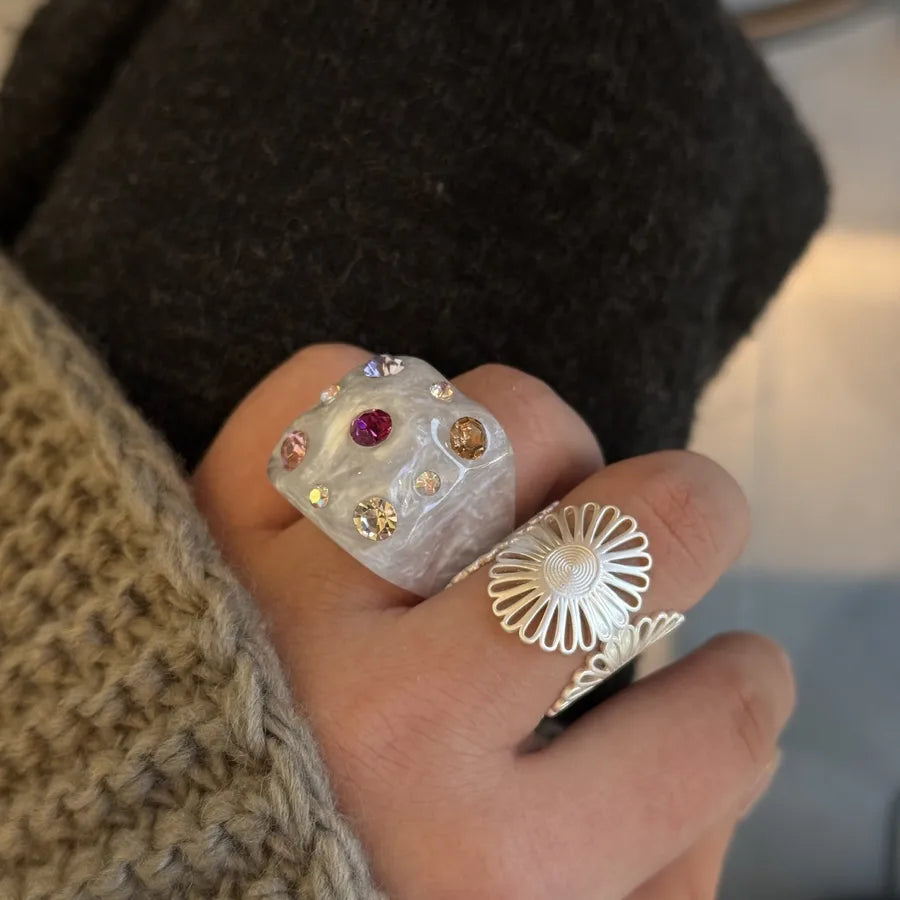 Introducing the Colorful Geometric Resin Ring with Inlaid Diamonds