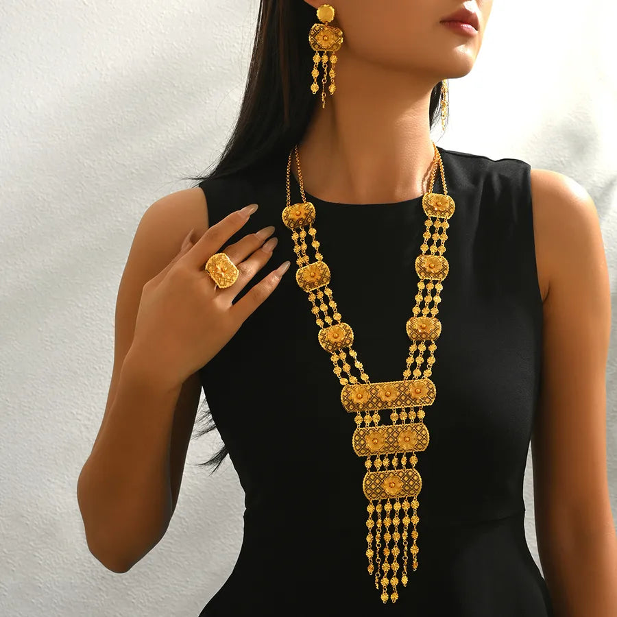 Elevate Your Elegance with the Four-Piece Vintage 18K Gold Plated Jewelry Set