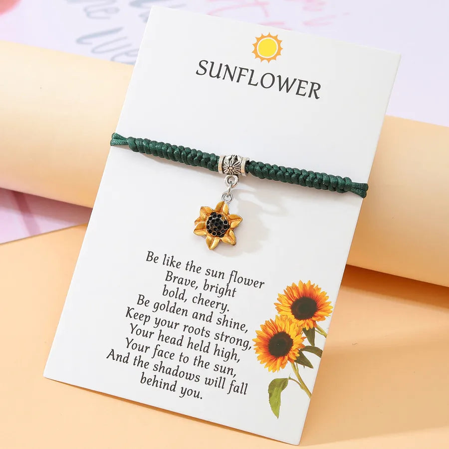 Elevate Your Style with the Rhodium Plated Oil Drop Sunflower Pendant Bracelet