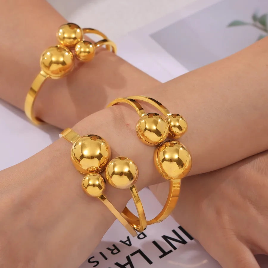 Elevate Your Style with the Simple Style Classic Round 304 Stainless Steel 18K Gold Plated Bangle