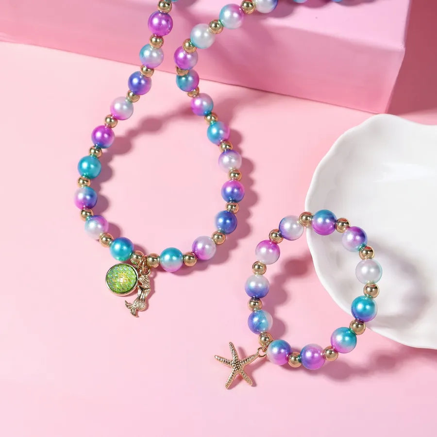 Discover the Enchantment of the Children Alloy Starfish Necklace and Beaded Bracelet