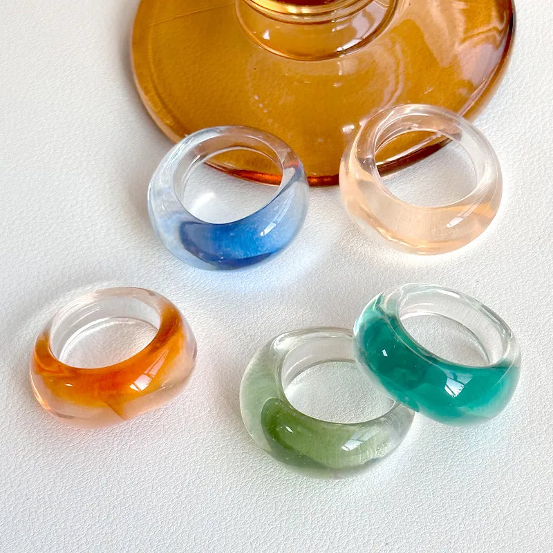 Discover the Elegance of Our New Resin Transparent Blue Gradient Oval Geometric Ring