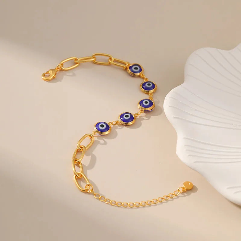 Elevate Your Style with the Retro Eye Copper Gold Plated Bracelet