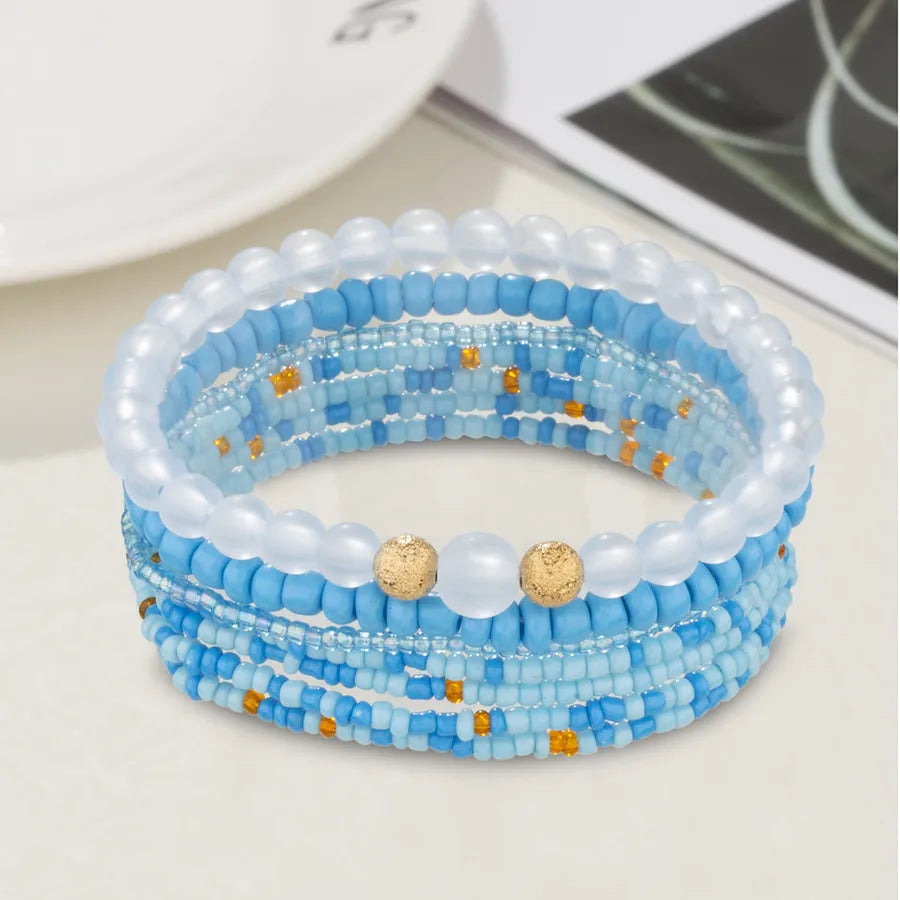Elevate Your Style with the Ocean Dopamine Glass Beads Multi-Layer Elastic Bracelet
