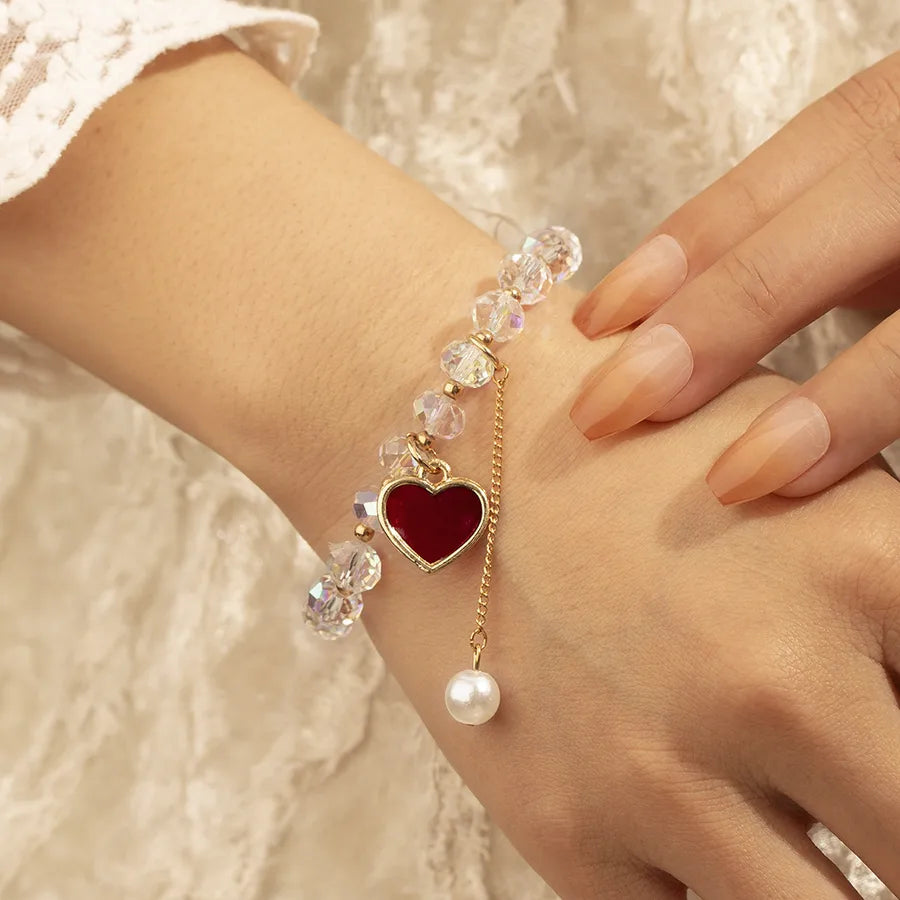 Embrace Elegance with Our Pearl Pendant Alloy Crystal Bead Heart Shaped Bracelet