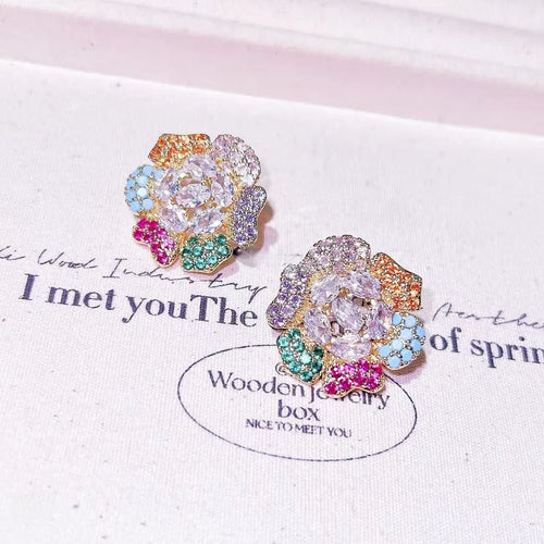 Simple Style Women’s Stud Earrings Featuring Flowers in Bezel Setting with Zircon Inlay and Metal Material